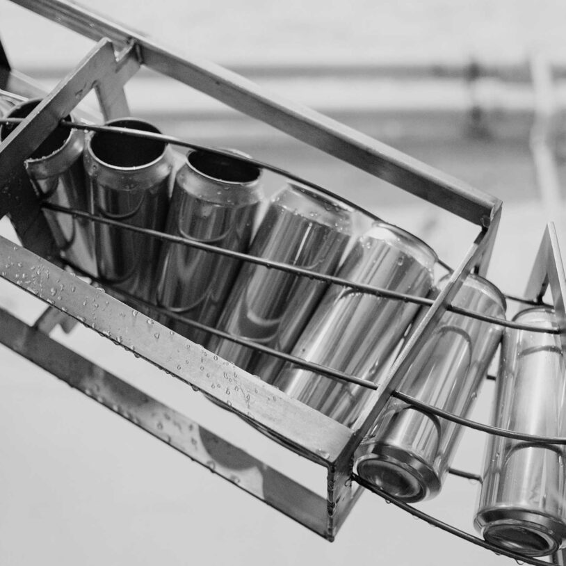 Image of metal cans on a conveyor system to represent Test and Measurement Industry