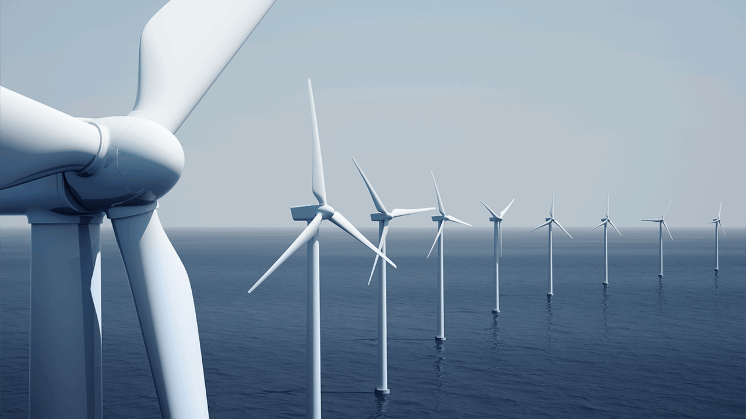 Image of alternative energy wind turbines in a row at sea.